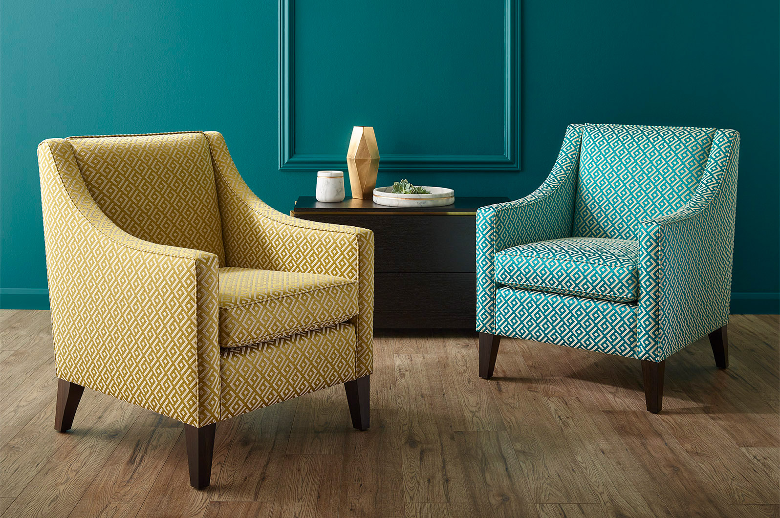 Studio set shot  built and lit to enhance the shapes and colours of the chairs. 